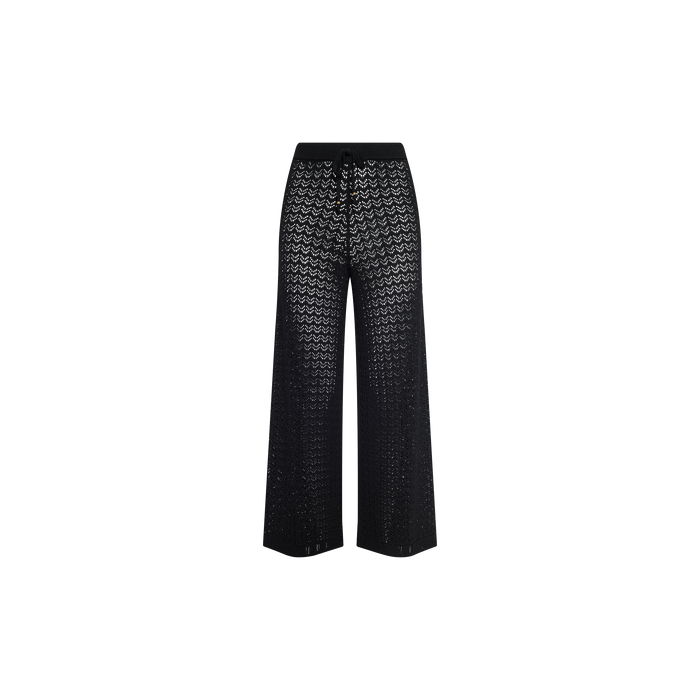 Gaelle Pointelle Knit Pant in black, featuring a wide-leg silhouette with a sheer, lacy zigzag pointelle knit pattern and an elastic waistband, shown against a plain white background.