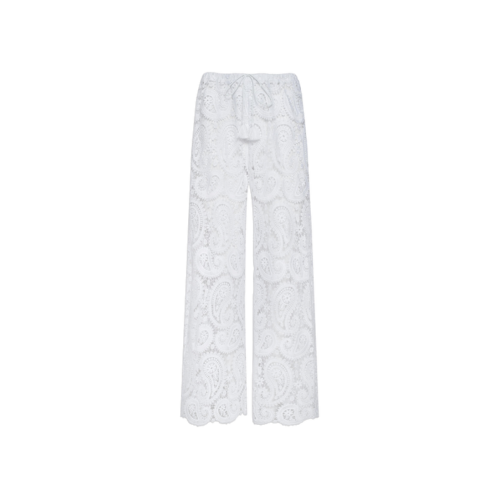 The Geraldine Cover-Up Pant features a white, wide-leg silhouette with an all-over paisley crochet lace pattern and a drawstring waist, displayed against a plain white background—an ideal choice for effortless resort wear.