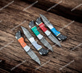 Handcrafted Damascus Steel Folding Knife – Vibrant Inlay Handle cskforged