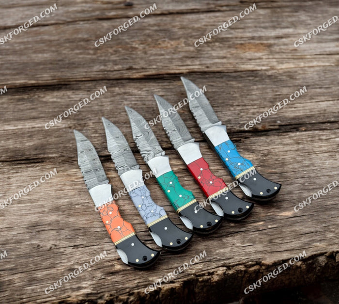 Handcrafted Damascus Steel Folding Knife – Vibrant Inlay Handle cskforged