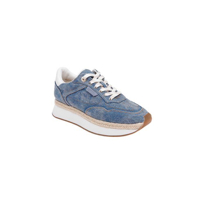 The Ivone Platform Sneaker is showcased on a plain white background, featuring a denim upper with white laces, a white interior, a tan woven-detail platform midsole, and a brown rubber sole.