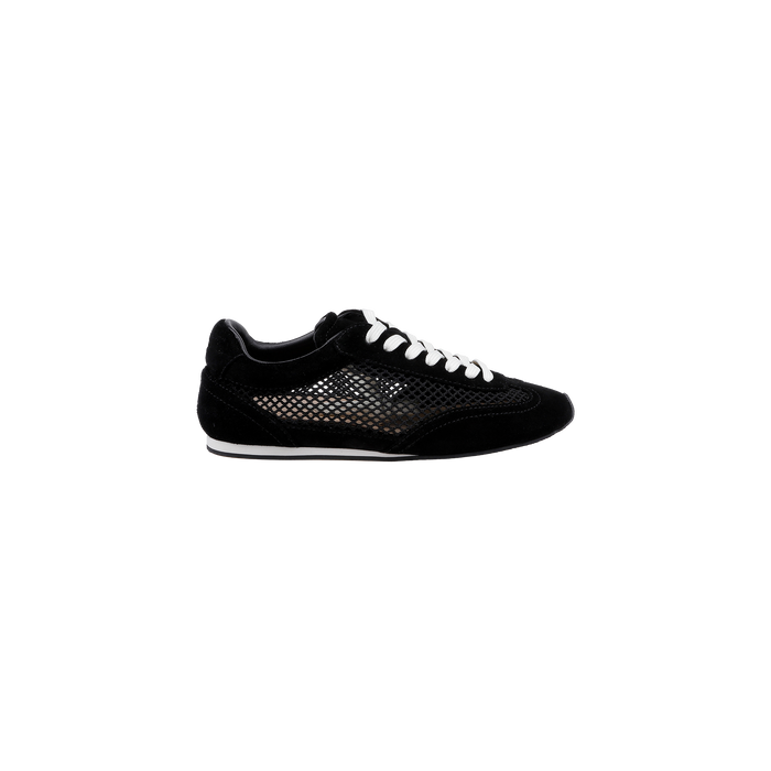 The Jarah Sneaker is a black suede shoe with white laces and a mesh side panel, displayed against a plain white background. This retro-inspired sneaker features a low profile, a white sole, and a comfortable memory foam insole.