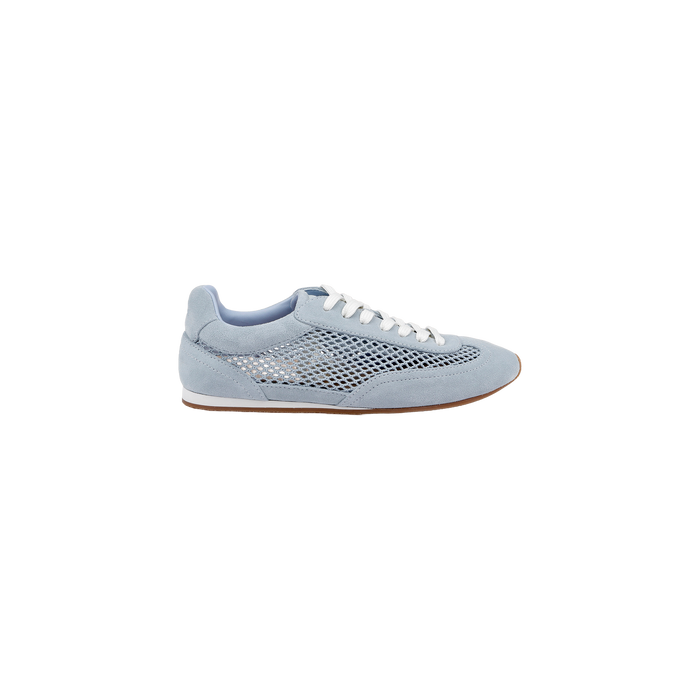 The Jarah Sneaker features a retro-inspired design in light blue suede, complemented by white laces, mesh side panels, suede accents, and a brown sole, displayed on a plain white background.