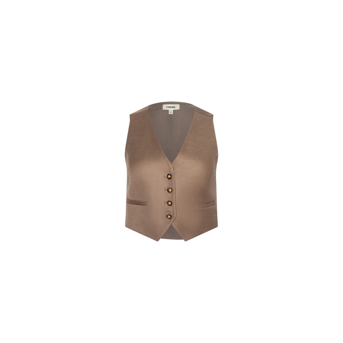 The Jianna Vest is a sleeveless linen vest in a taupe shade, featuring a V-neckline, four brown buttons down the front, and two small pockets. Shown against a plain white background, this minimalist piece offers a refined and timeless look.