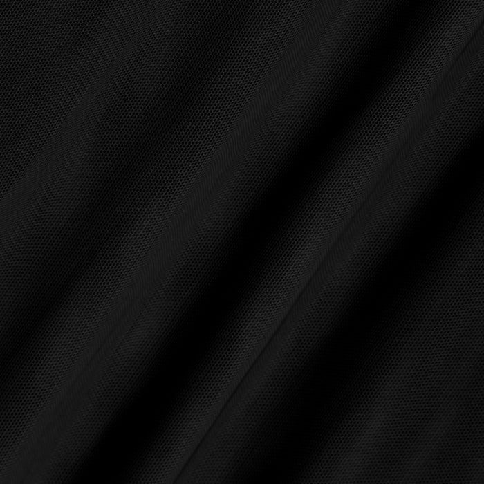 Close-up of the Kalea Mesh Bodysuit fabric in black, featuring diagonal, subtly textured lines and gentle folds that form an elegant pattern of alternating light and shadow across the surface.