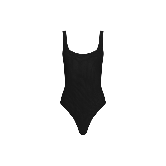 The Kalea Mesh Bodysuit features a plain black one-piece design with wide shoulder straps and a scoop neckline, showcased against a white background.