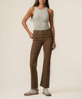 Pecan high-rise ankle flare jeans with five-pocket styling and subtle flare from knee to hem.