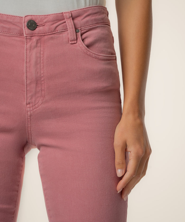 Rose pink high-rise ankle flare jeans with button closure and front pockets, shown at waist and thigh level.