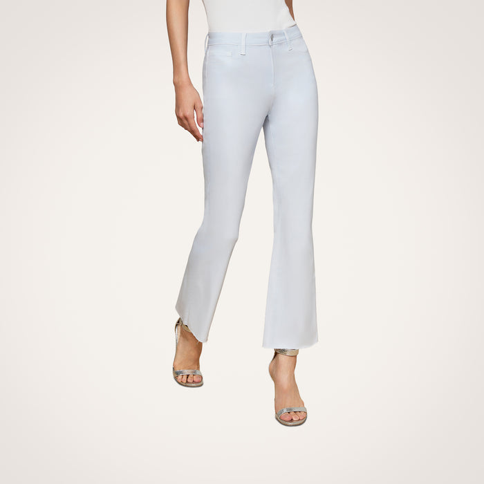 A person is shown from the waist down wearing the Kendra Coated Cropped Flare Jean in light gray with heeled sandals, standing against a plain white background. The upper body and face are not visible in the image.