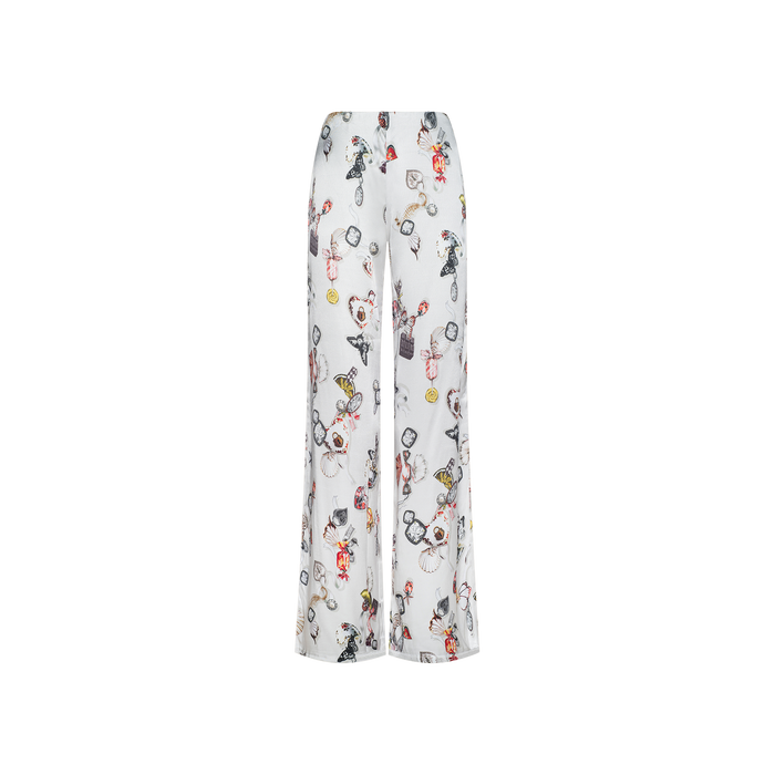 The Kimia Satin Pant is a white, high-rise, wide-leg pajama pant crafted from satin and adorned with a colorful, playful print of cartoon animals and whimsical objects scattered across the fabric.