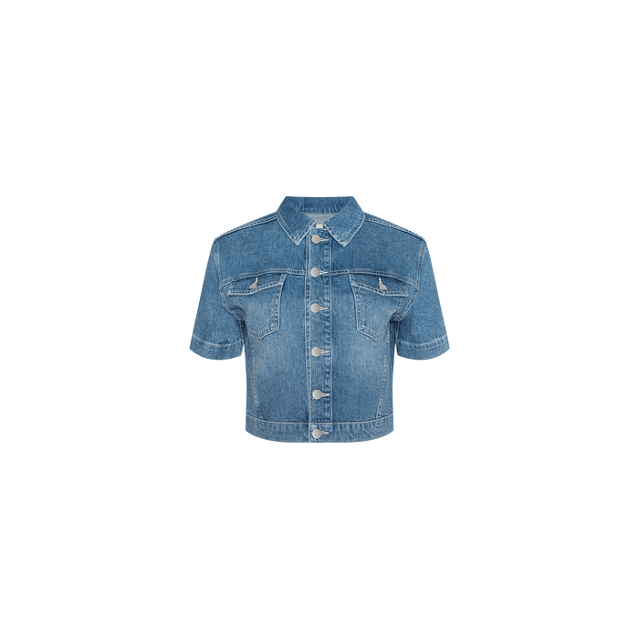 The Kirstie Jean Shirt Jacket is a short-sleeve denim piece featuring a button-up front, two chest pockets, and a collar, shown against a plain white background.