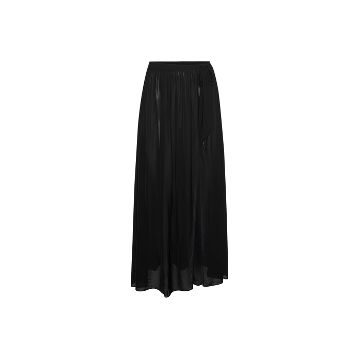 The Klaire Cover-Up Skirt is a long black sheer wrap maxi skirt with a slightly flared hem, crafted from viscose chiffon for a subtle glossy finish, featuring an elastic waistband and elegant tie closure, displayed on a white background.
