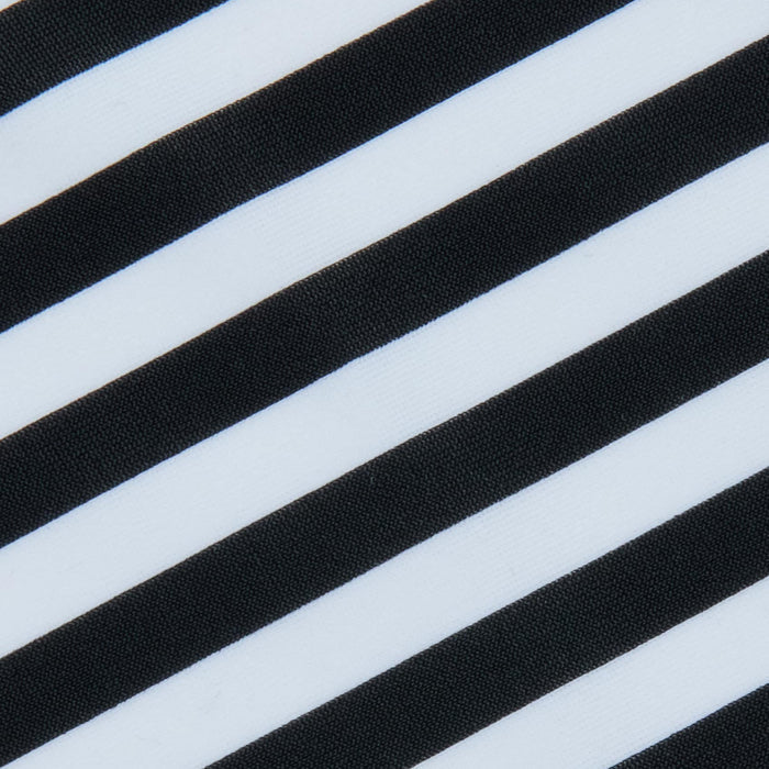 Alternating diagonal black and white stripes create a bold, high-contrast pattern across the Kristin Triangle Bikini Top, evoking the striking visual style of classic French Riviera swimwear.