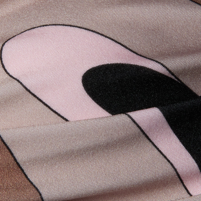 Close-up of the Krysta Halter Bikini Top fabric featuring an abstract swirl print in shades of pink, black, and beige with curved and outlined shapes.