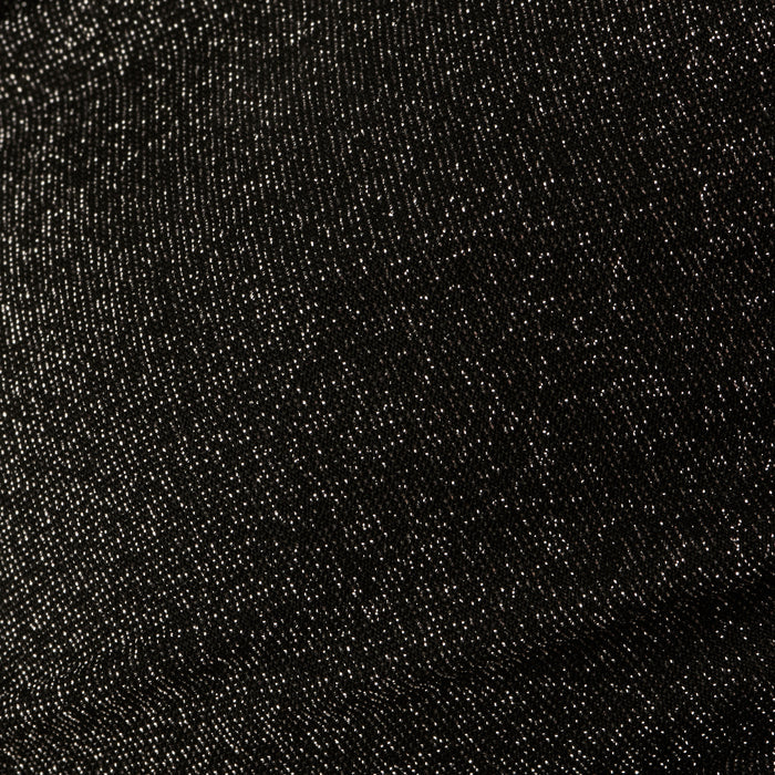 Close-up of the Krysta Halter Bikini Top’s textured black fabric, featuring a subtle sheen and fine weaving patterns reminiscent of metallic black.