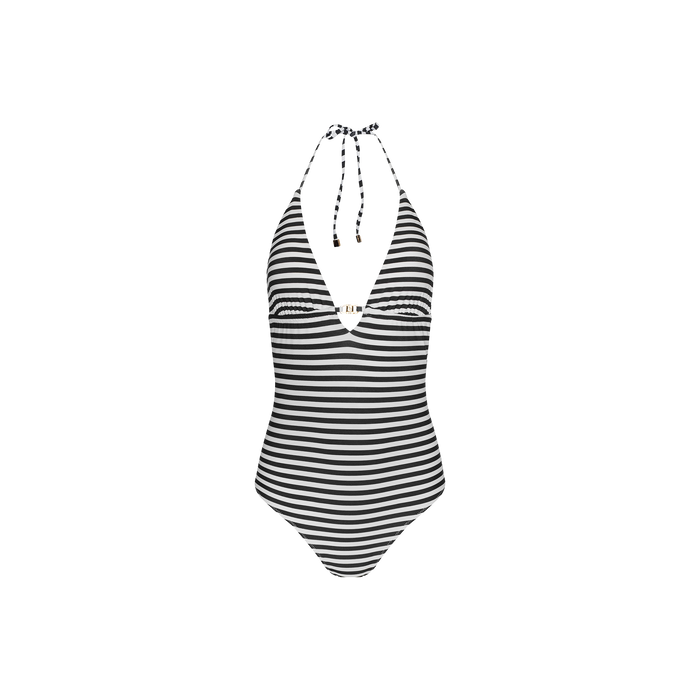 The Leila Halter One-Piece Swimsuit features bold black-and-white stripes in a chic halter design, highlighted by a deep V-neckline and a striking chest cutout for an effortlessly glamorous French-inspired look. Displayed on a plain white background.