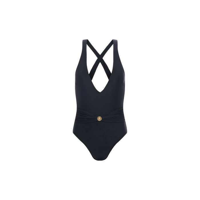 Lisa Plunge One-Piece Swimsuit in black, featuring a plunging neckline, crisscross straps at the back, a gold decorative button at the waist, and a ruched waistband. Displayed against a plain white background.