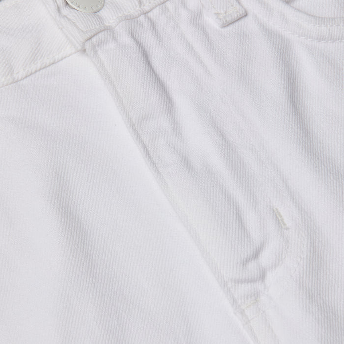 Close-up of the front of the Lissania Jean Short, featuring a high-rise waistband, metal button, pocket, and detailed stitching for a tailored silhouette.