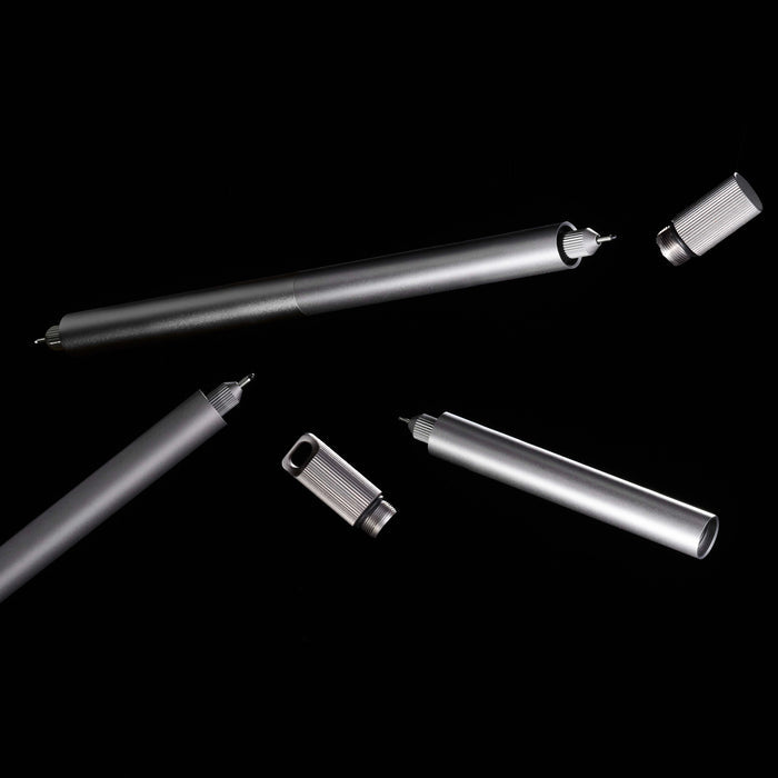 The full Titanium Lumos range shown in a floating flat lay: Pro Duo, Mini, loop lids, and tip holders displayed mid-air with a clean black backdrop.