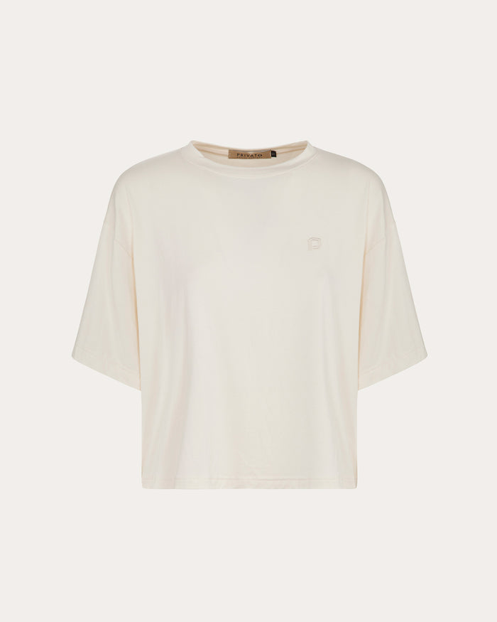 Maglietta off-white con maniche scese