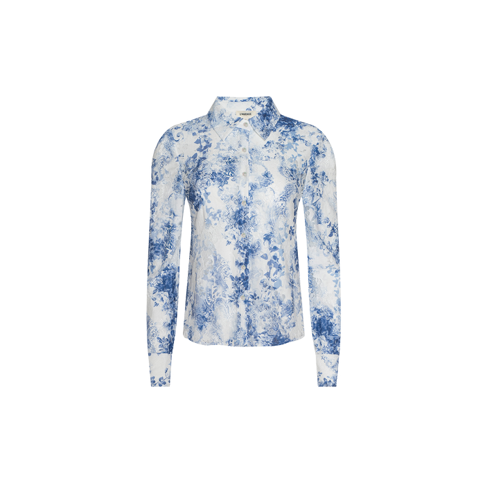 Maia Lace Blouse in long-sleeve navy, featuring a pointed collar and button-up front. Crafted from white fabric with an intricate blue floral toile print for a timeless yet modern look. Displayed against a plain white background.
