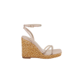Malone Wedge Espadrille in beige, featuring an ankle strap, clear toe straps, and a woven straw platform sole, displayed in a side profile on a white background.