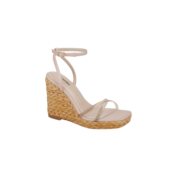 Malone Wedge Espadrille shown on a plain white background, featuring a beige raffia wedge heel, clear toe strap, and a slim ankle strap with a small buckle.