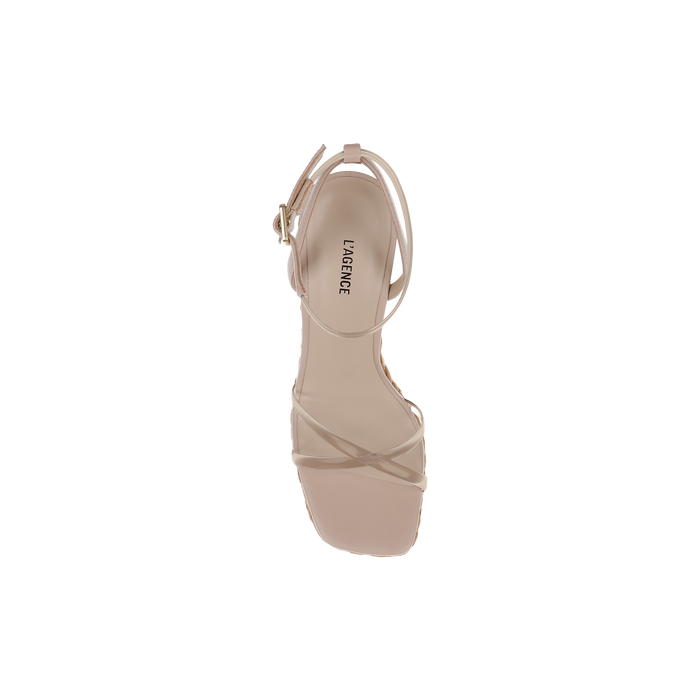 Beige Malone Wedge Espadrille sandal with a square toe and ankle strap, viewed from above, featuring subtle bohemian style influences. The brand LAGENCE is printed on the insole.