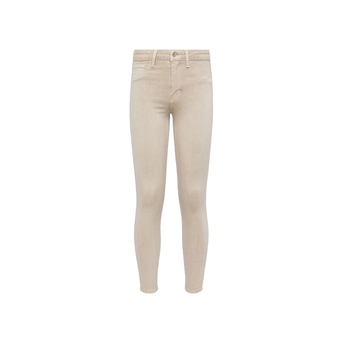 The Marguerite Skinny Jean is displayed on a plain white background, shown from the front to highlight its pockets, belt loops, and button closure. Made from high-recovery fabric, these beige jeans feature a tapered leg for a sleek silhouette.