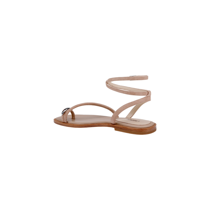 The Mariana Suede Sandal, crafted in tan suede with asymmetric straps, features a delicate ankle strap and minimalist toe loop, set on a light brown sole against a plain white background.