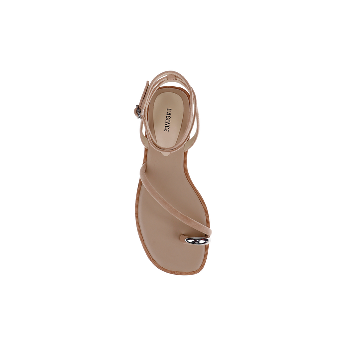 The Mariana Suede Sandal, featuring a square toe, asymmetric thin straps, and a metallic accent at the toe, is shown from above in tan suede against a plain white background.