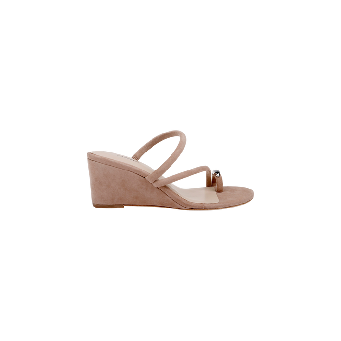Introducing the Maritza Wedge Sandal: a taupe wedge with a suede upper, two slim straps—including one adorned with a metallic accent—and an open-toe design. The comfortable wedge heel and memory foam insole ensure all-day wearability.