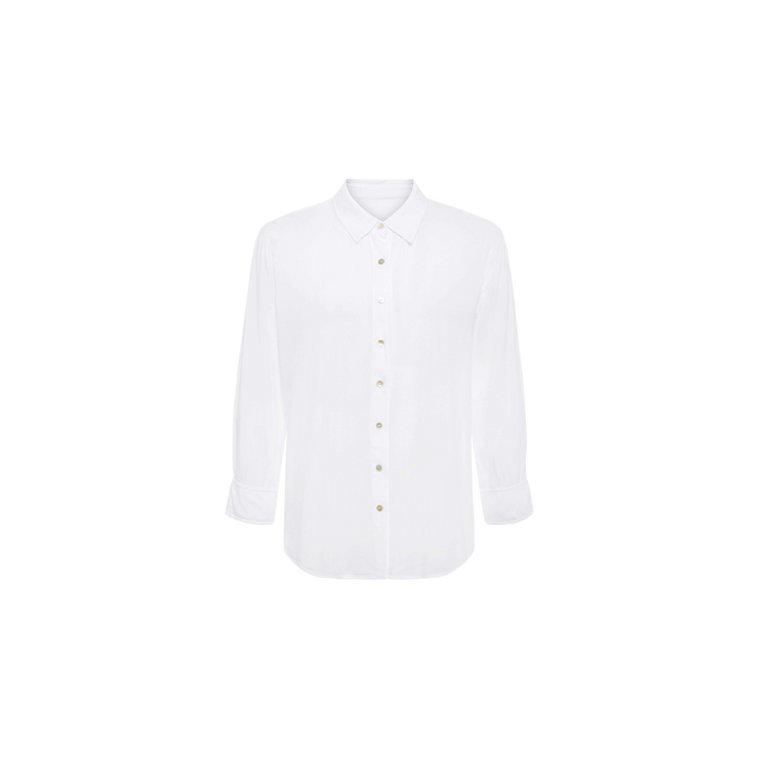 The Marlene Blouse is a plain white long-sleeve button-down shirt with a collar, featuring classic shirting details and a relaxed fit, displayed on a white background.