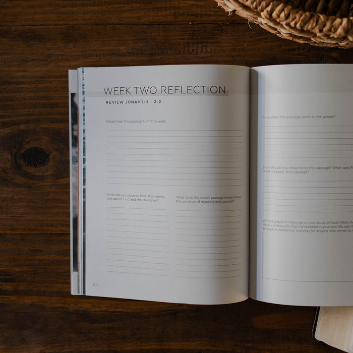 Week 2 reflection page of Mercy in the Storm Christian Bible study for men open on a table