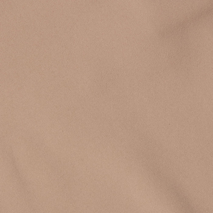 A close-up of the Mietta Knit Bandeau Top’s light brown fabric showcases subtle diagonal weave patterns and gentle creases, highlighting the stretch nylon material often used in supportive bandeau styles.