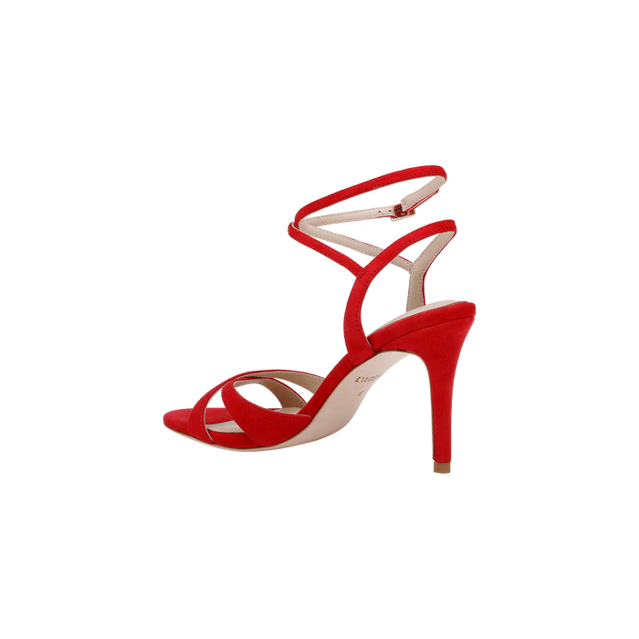 The Miranda Suede Sandal, crafted in vibrant red suede, features a stiletto heel, thin ankle-wrap straps with an adjustable buckle—an elegant evening shoe showcased on a plain white background.