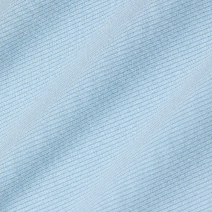 Close-up of the Nica Scoopneck Bodysuit in light blue, featuring fine, diagonal, evenly spaced lines that create a subtle striped pattern. The high recovery stretch rib enhances the soft and smooth texture, giving the fabric a gentle and calming visual effect.