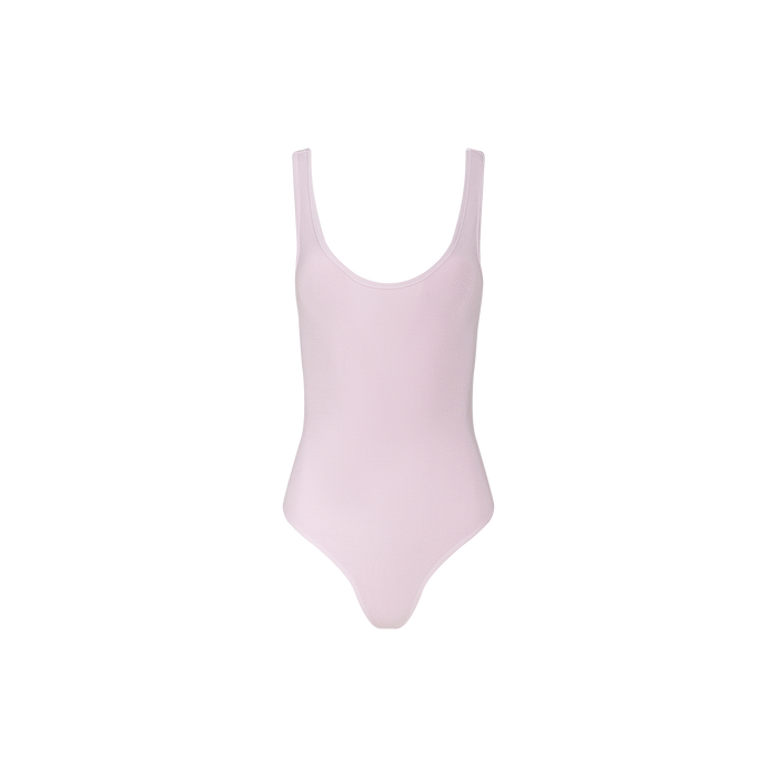 The Nica Scoopneck Bodysuit is a light pink, sleeveless piece featuring high-cut leg openings, shown against a plain white background.