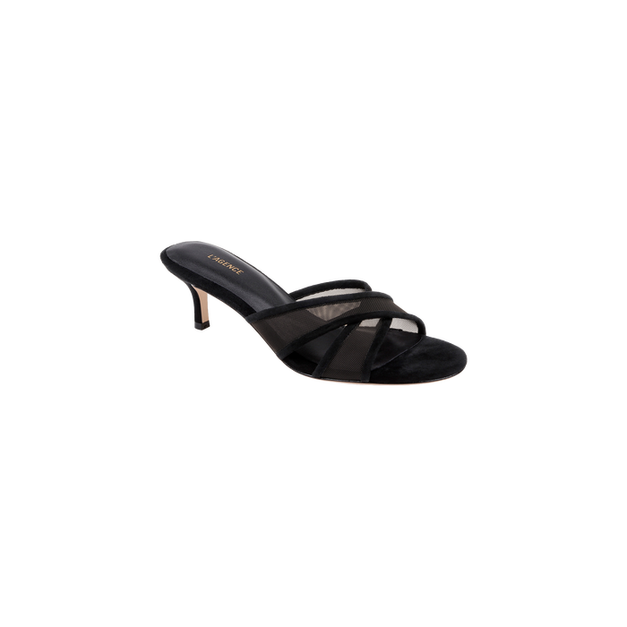 Padua Mesh Sandal in black with an open toe, crisscross mesh straps, and a slim heel. Designed for comfort with a memory foam insole, the sandal features a black footbed with gold text. Shown on a plain white background.