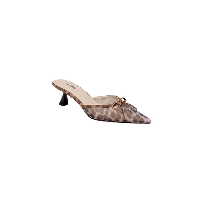 The Palermo Mesh Mule features a leopard print design, a pointed toe, a delicate bow on top, and a low sculpted black heel.