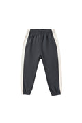 Dark gray jogger pants with off-white side stripes, featuring an elastic waistband and elastic cuffs, shown flat on a white background.