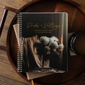 Peaks and Valleys Spiral Study on a dark brown wooden tray with a black coffee cup next to it on a brown wooden table