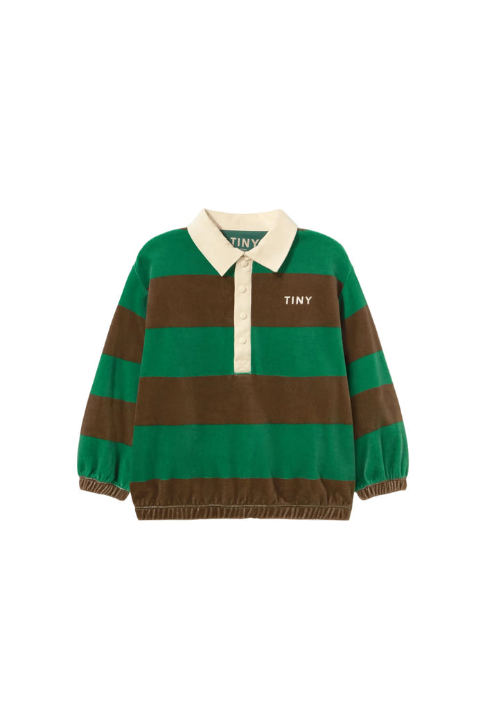 A green and brown horizontally striped long-sleeve rugby shirt with a cream collar and button placket, featuring the brand name 'TINY' on the chest, shot against a solid off-white background.