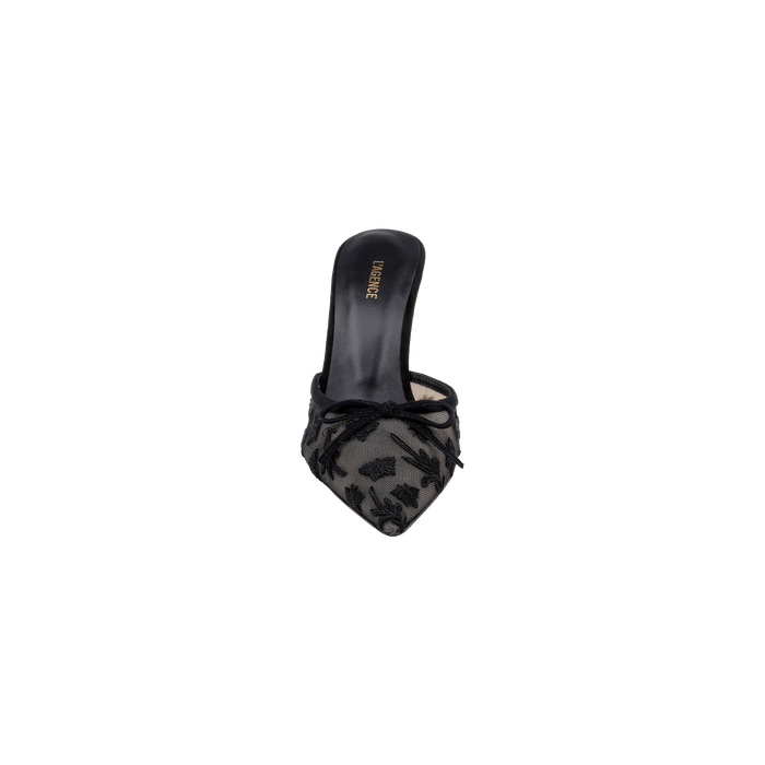 The Prasad Mesh Mule, featuring a pointed toe, sculpted heel, and delicate butterfly embroidery on black mesh, is viewed from above against a plain white background.