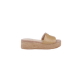 The Ramani Platform Espadrille features a woven raffia upper in beige and a thick, textured platform sole, showcased against a plain white background.