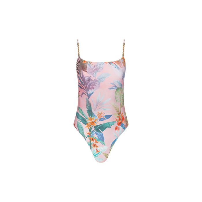Introducing the Remi One-Piece Swimsuit—a flattering high-leg maillot featuring a pastel pink base adorned with vibrant palm leaf and flower prints, accented by thin gold chain shoulder straps.