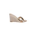 The Rosaline Wedge Espadrille is a gold metallic espadrille wedge sandal featuring an open toe, two wide gold leather straps across the foot, and a woven, textured wedge heel. A memory foam insole provides added comfort to this stylish design. The sandal is shown against a plain white background.