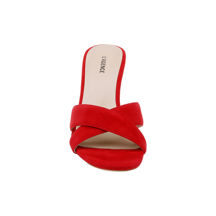 A red slip-on wedge espadrille featuring wide crisscross red suede straps and an open toe, with a beige insole marked LAGENCE near the heel. Product name: Rosaline Wedge Espadrille.