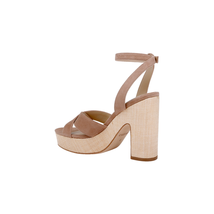Introducing the Sandrine Platform Sandal—an open-toe, high-heeled platform sandal with a thick sole and ankle strap, crafted with tan suede straps and set on a coordinating raffia-wrapped wedge heel.