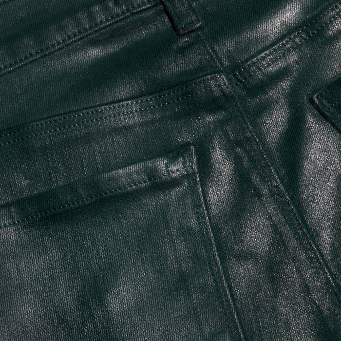 Close-up of the Selma Coated Bootcut Jean in dark green, highlighting the textured coating, detailed stitching, and upper section of the front pocket and belt loop.